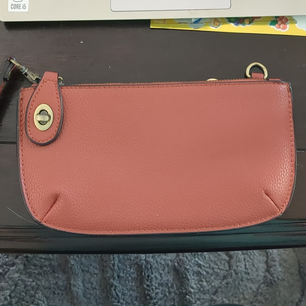Brown leather clutch